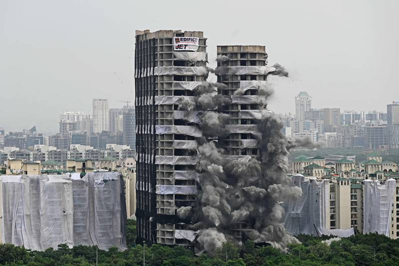 Construction on Apex and Ceyanne buildings, popularly known as the Twin Towers, stopped after residents brought a lawsuit against developer Supertech that claimed they violated the site plan and blocked air and sunlight to hundreds of nearby homes. Photo: AFP