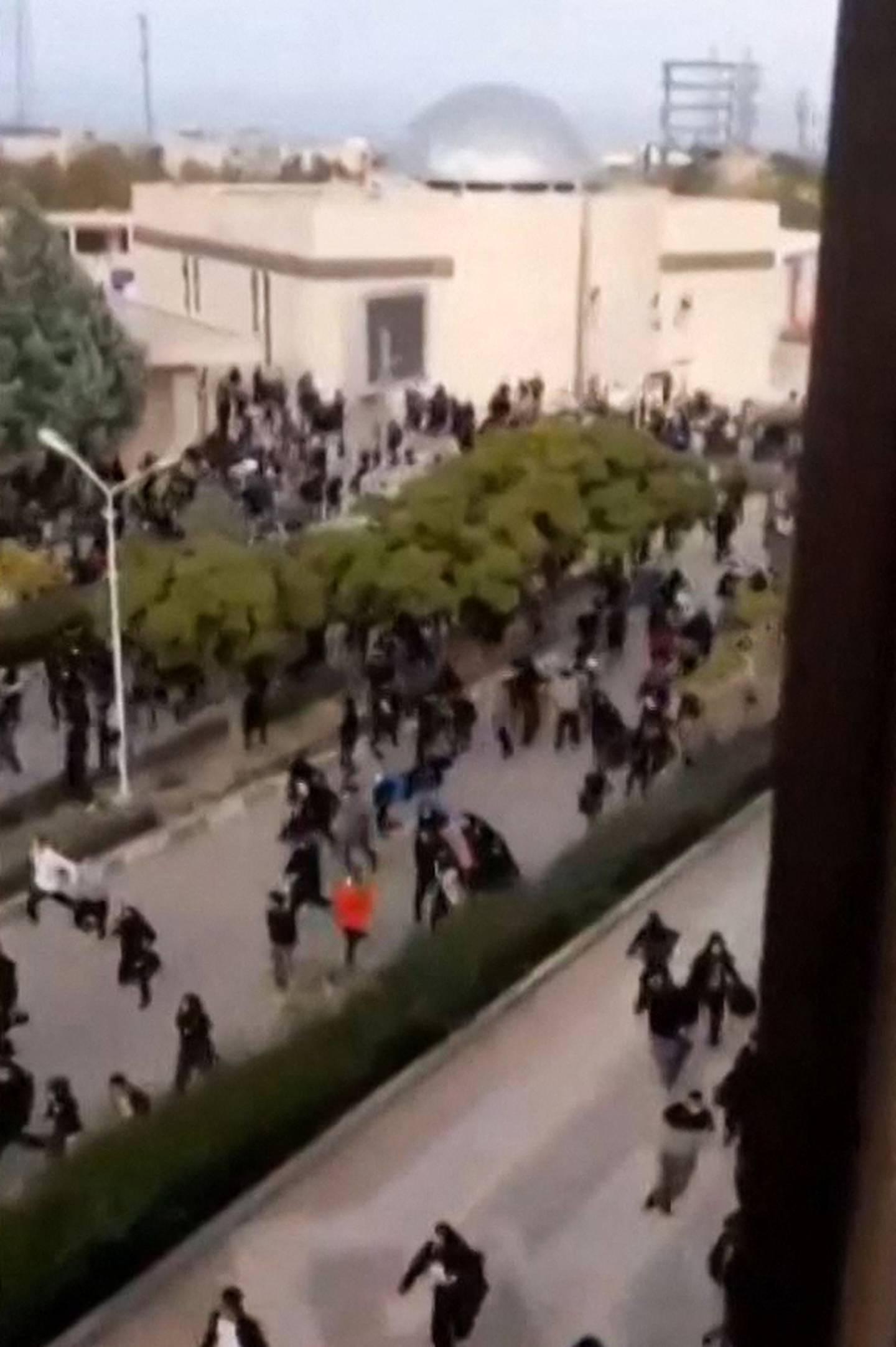 A UGC video posted on October 28 reportedly showing security forces firing at protesters at Islamic Azad University of Mashhad.  AFP