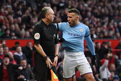 Manchester City defender Nicolas Otamendi remonstrates with the linesman. AFP