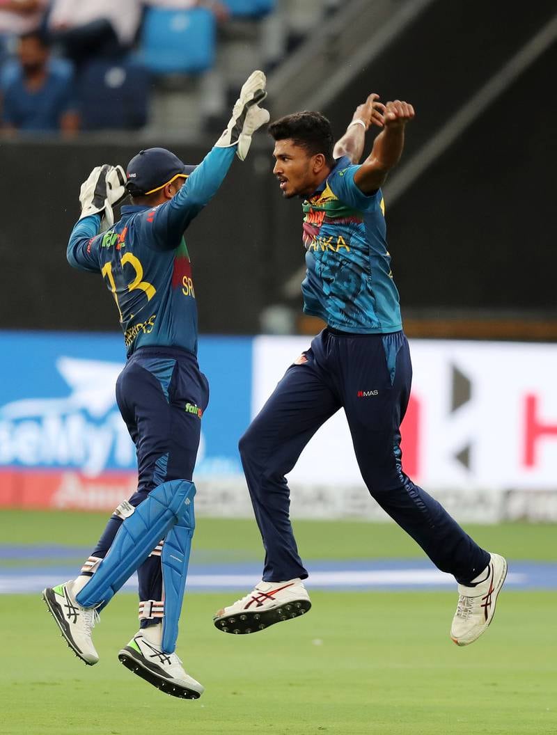Sri Lanka's Dilshan Madushanka, right, celebrates after bowling India's Virat Kohli. Chris Whiteoak / The National