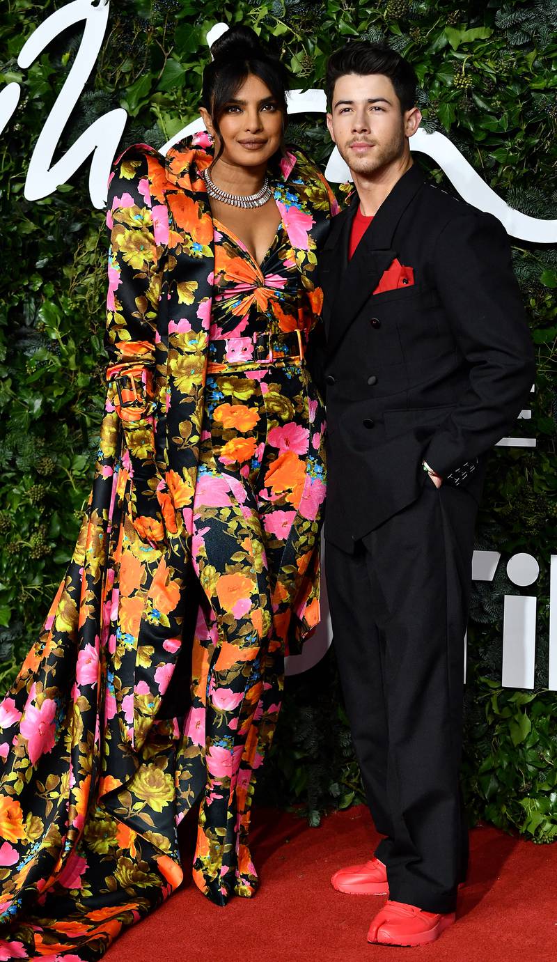 Chopra and Jonas pose on the red carpet at The Fashion Awards 2021 in London on November 29, 2021. AFP