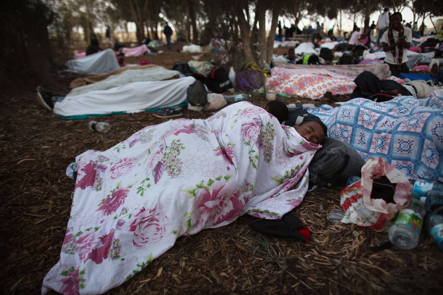 Asylum seekers at an outdoor camp near Nitzana border crossing with Egypt in the Negev Desert in 2014. AFP