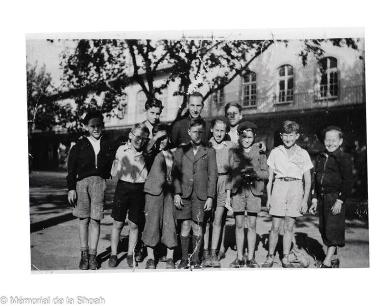 A group of Jewish boys hidden at the Don Bosco school in Nice pictured with their teacher in September 1943. Memorial de la Shoah/Coll.Serge Klarsfeld