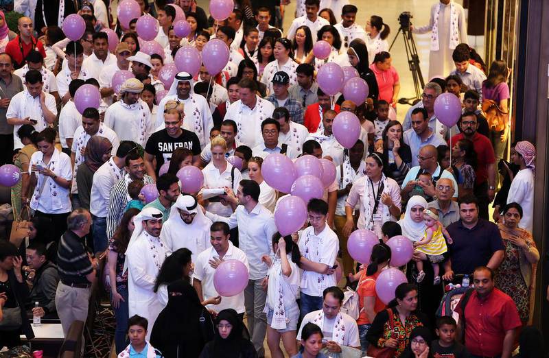 About 1,000 people took part in the walkathon at Dubai Mall for World Down Syndrome Day on Friday. Pawan Singh / The National