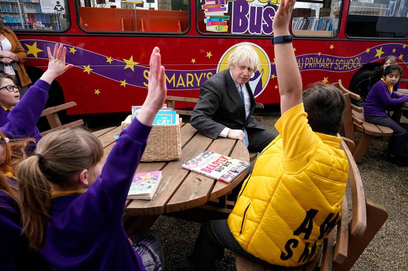 Boris Johnson is visiting the school to see how their preparations are going ahead of students returning on March 8. AFP
