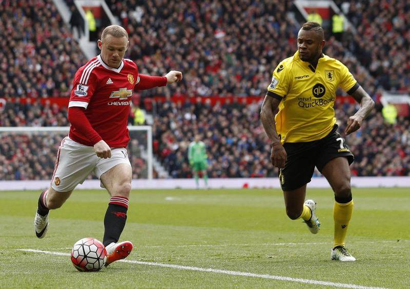 Manchester United’s Wayne Rooney in action with Aston Villa’s Leandro Bacuna. Action Images via Reuters / Jason Cairnduff