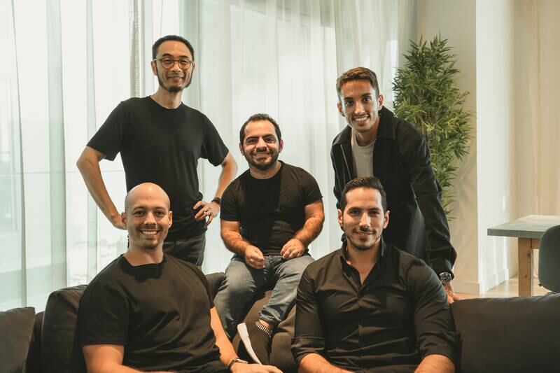Jad Antoun, chief executive and co-founder of Huspy, centre, with the leadership team of the start-up. Photo: Huspy