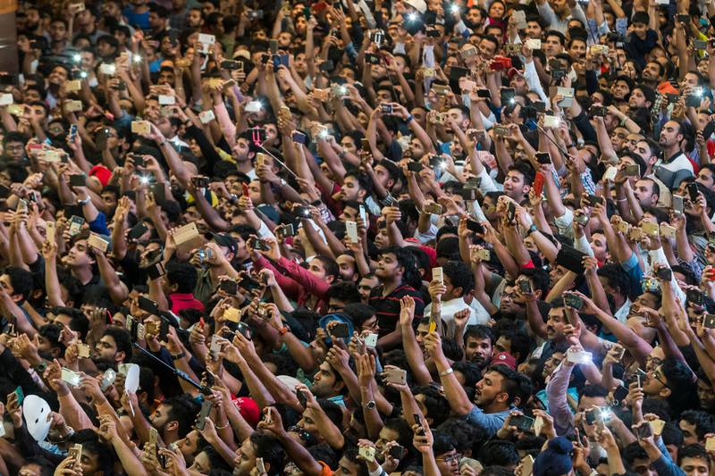 The crowd gets ready for Shah Rukh Khan's appearance at Dalma Mall. Antonie Robertson / The National
