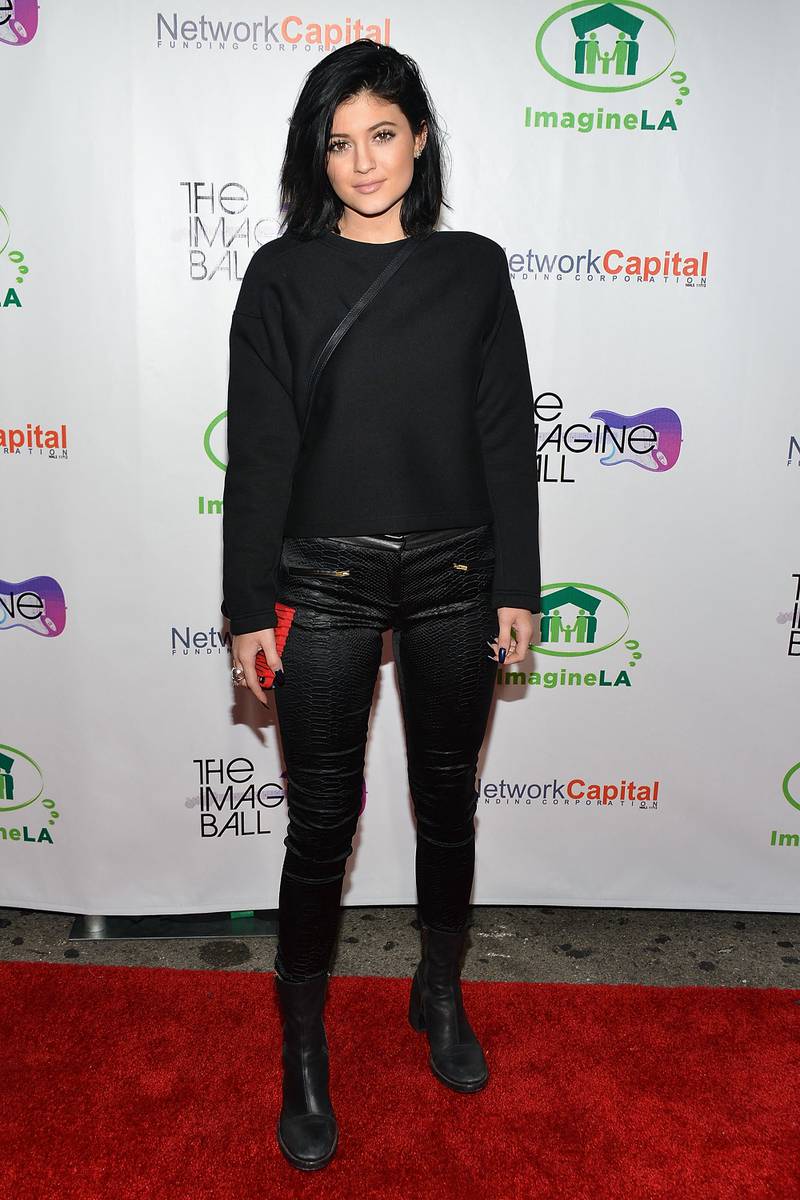 Kylie Jenner, in black jeans and a jumper, arrives at The Imagine Ball held at House of Blues Sunset Strip on August 6, 2014 in West Hollywood, California. AFP