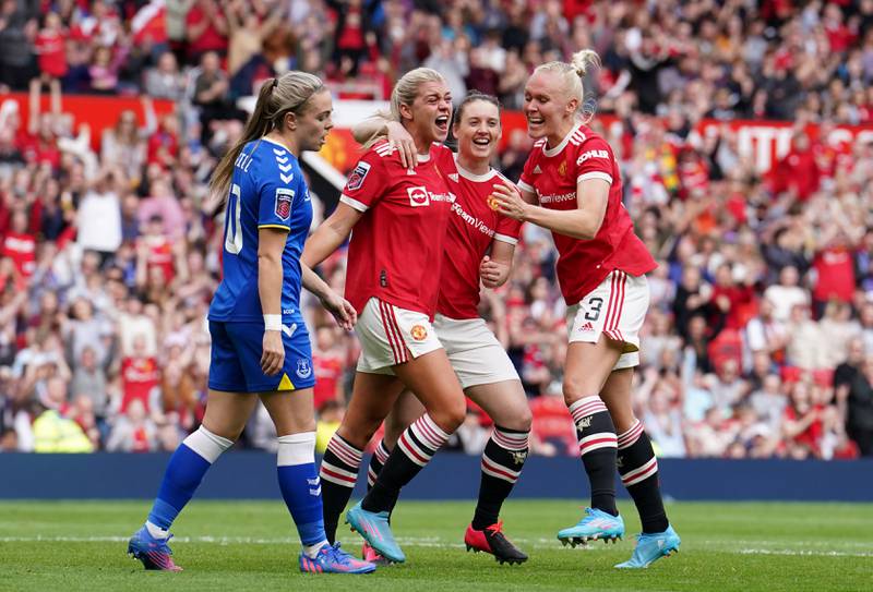 Alessia Russo celebrates with team-mates after scoring the third goal at Old Trafford. PA