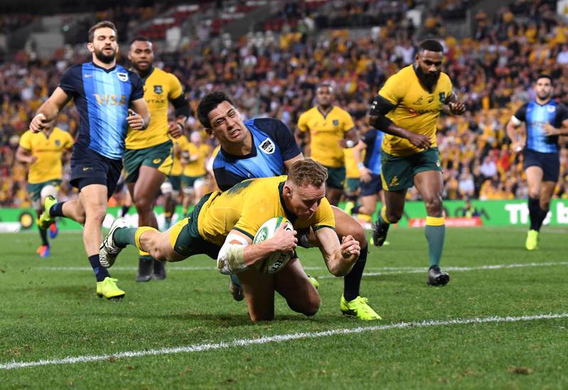 epa07743693 Reece Hodge of the Wallabies scores a try during the Rugby Championship match between Australia and Argentina at Suncorp Stadium in Brisbane, Australia, July 27, 2019.  EPA/DAN PELED  AUSTRALIA AND NEW ZEALAND OUT
