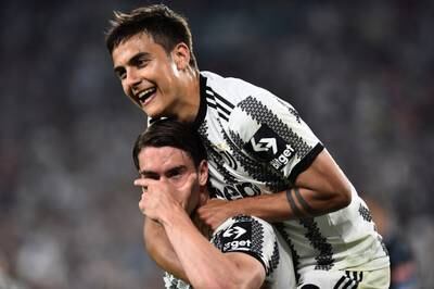 Juventus' Dusan Vlahovic celebrates scoring their first goal in a 2-2 draw against Lazio with Paulo Dybala. Reuters