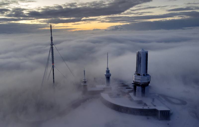 The top of the Feldberg mountain is surrounded by fog and clouds near Frankfurt, Germany. AP
