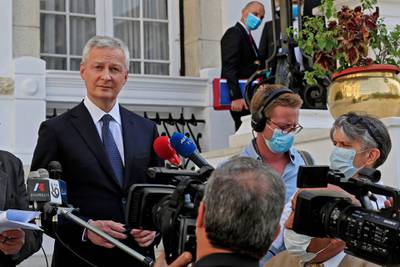 France's Economy and Finance Minister Bruno Le Maire speaks to reporters after his meeting with the Egyptian prime minister at the prime minister's office in the capital Cairo on June 13, 2021.  / AFP / Khaled DESOUKI
