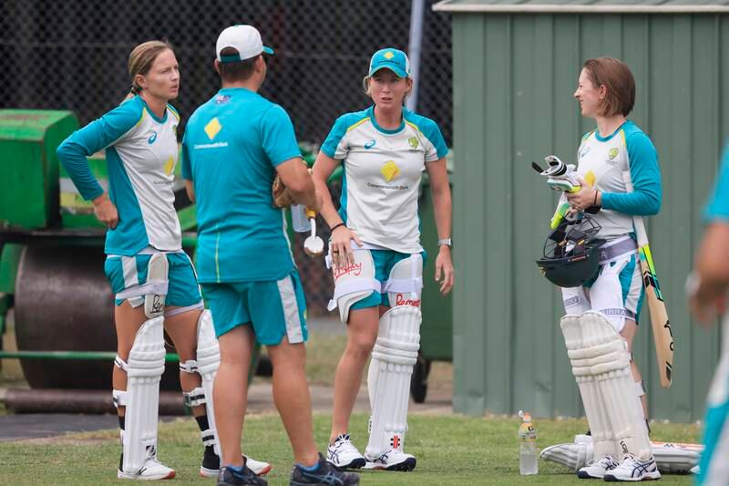 Australia coach Matthew Mott talks to Meg Lanning, Beth Mooney and Rachael Haynes at the Manuka Oval. Getty