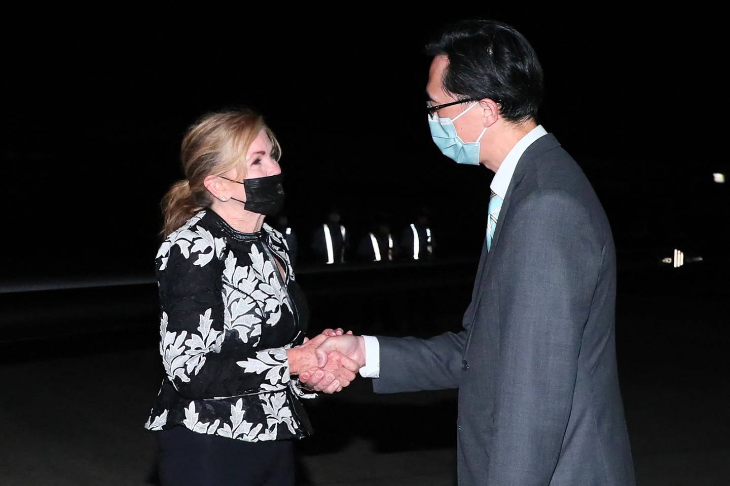 US Senator Marsha Blackburn is greeted by a Taiwanese official upon her arrival at the Sungshan Airport in Taipei. Taiwan's Ministry of Foreign Affairs 