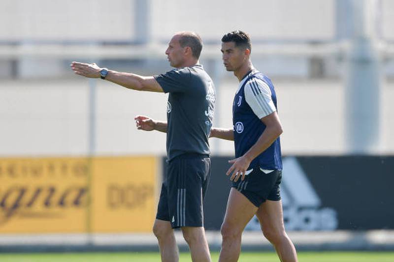Juventus coach Massimiliano Allegri with Cristiano Ronaldo during training in Turin.