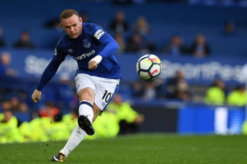 Everton striker Wayne Rooney crosses the ball during the Premier League match against Burnley at Goodison Park on October 1, 2017. AFP