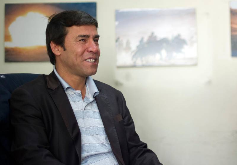 FILE - In this file photo taken April 17, 2012 and released by the Agence France-Presse (AFP) on Monday, April 30, 2018, showing AFP photographer Shah Marai at the AFP bureau in Kabul. AFP chief photographer in Kabul, Shah Marai, was killed Monday April 30, 2018, AFP has confirmed, in a secondary explosion targeting a group of journalists who had rushed to the scene of a suicide blast in the Afghan capital.(Johannes Eisele/AFP via AP)
