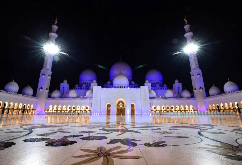 Sheikh Zayed Grand Mosque in Abu Dhabi is illuminated for Ramadan. Victor Besa / The National