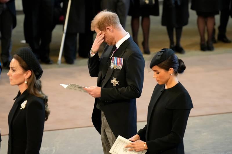 Prince Harry and Meghan pay their respects at the Palace of Westminster. Getty 