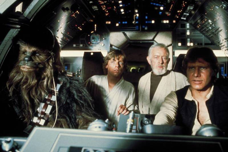 Chewbacca, Luke Skywalker, Obi-Wan Kenobi, and Han Solo in the Millennium Falcon in the original Star Wars movie (Courtesy: Lucasfilm Ltd)