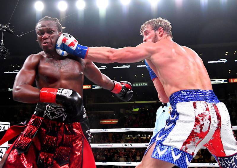 Logan Paul, right, takes a swing at KSI. Getty