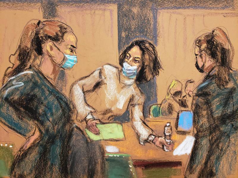 This courtroom sketch shows Ghislaine Maxwell arriving at court in New York with two US marshals for her trial on charges of sex trafficking. AFP