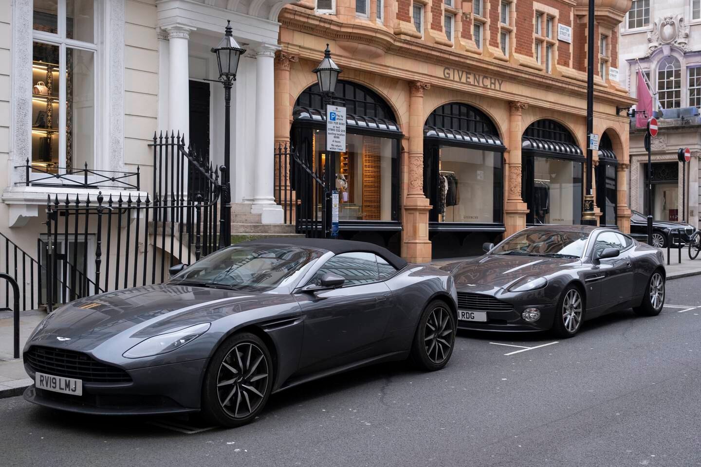Aston Martin sports cars parked in Mayfair. Getty Images