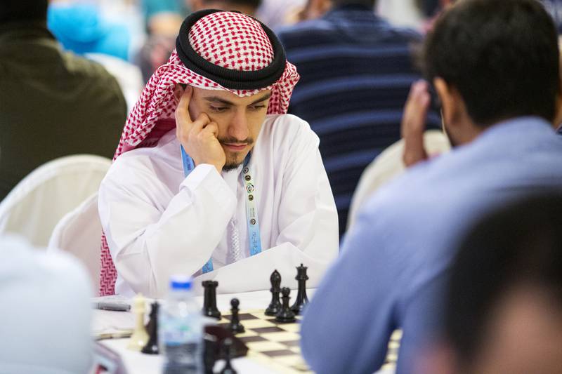 Readers congratulate Saleh Salem on winning the Asian Continental Chess Champion title. Christopher Pike / The National





