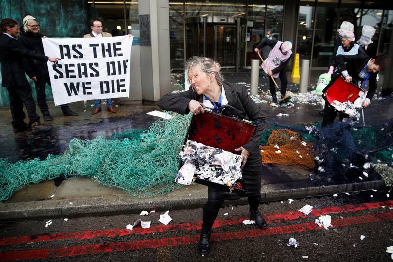 Ocean Rebellion activists stage a protest outside the International Maritime Organisation in London on Monday. Reuters