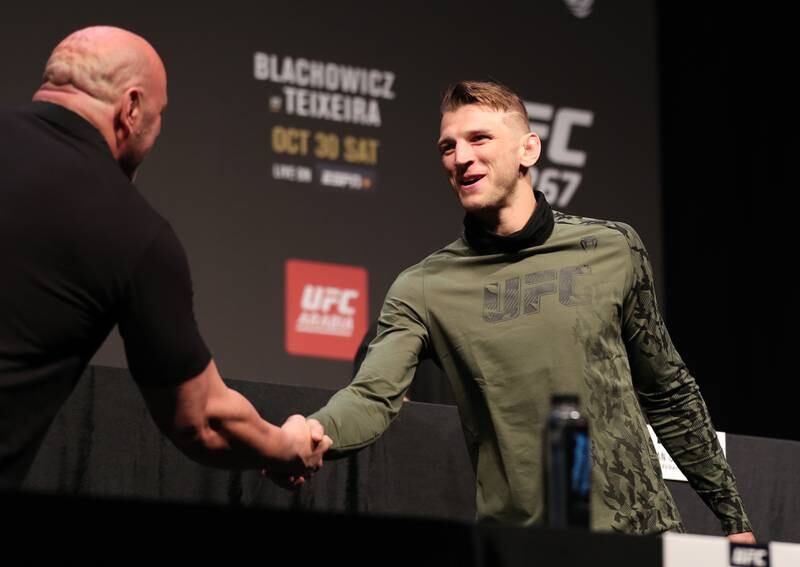 UFC lightweight Dan Hooker shakes hands with UFC president Dana White at the press conference before UFC 267.