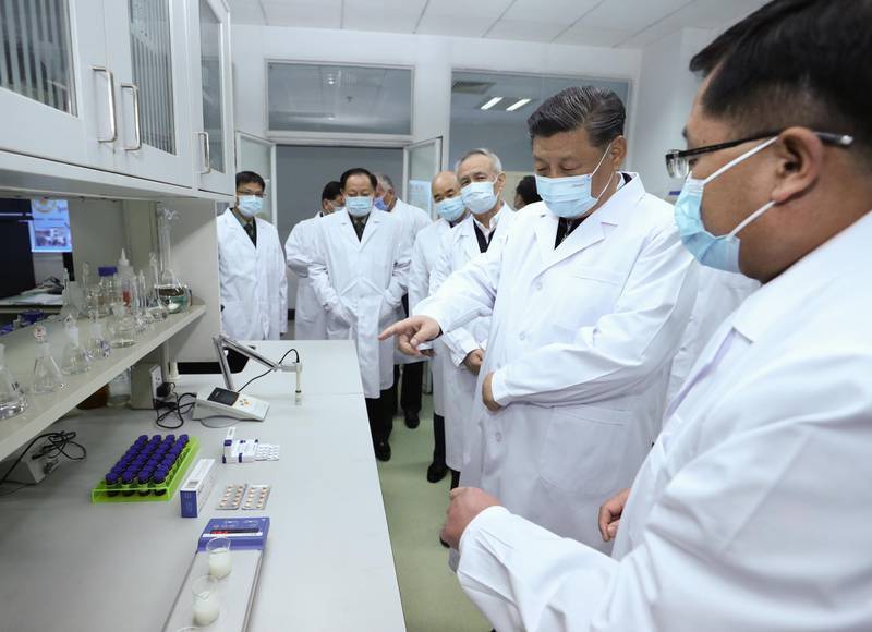 Chinese President Xi Jinping learning about the progress on the vaccine and anti-body during his visit to the Academy of Military Medical Sciences in Beijing, capital of China.  EPA