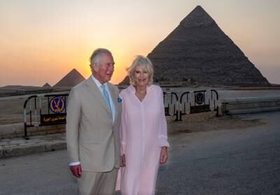 Charles and Camilla in front of the Great Pyramids of Giza.  Reuters