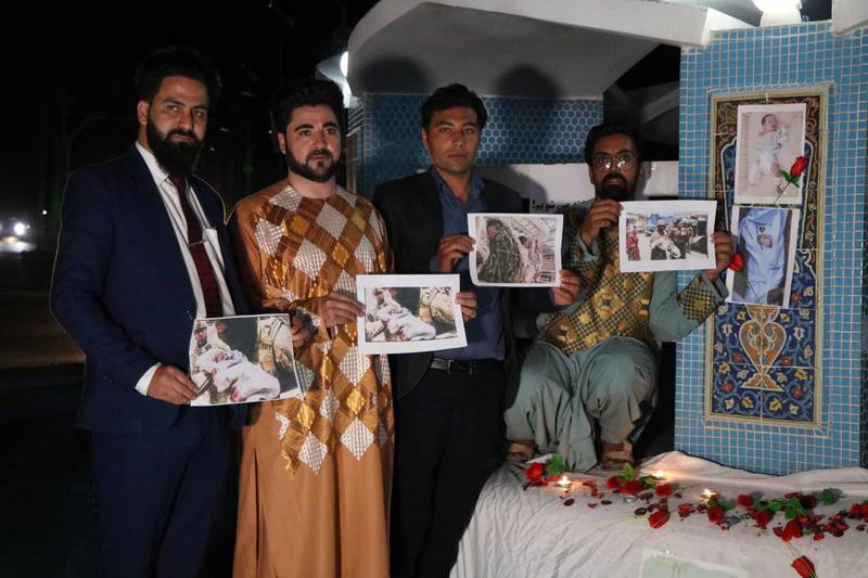 Afghans light candles during a memorial for the victims of MSF hospital and Funeral suicide bomb attack, in Herat, Afghanistan.  EPA