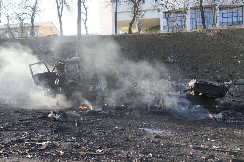 Debris of a burnt military truck on a street in Kiev. AP