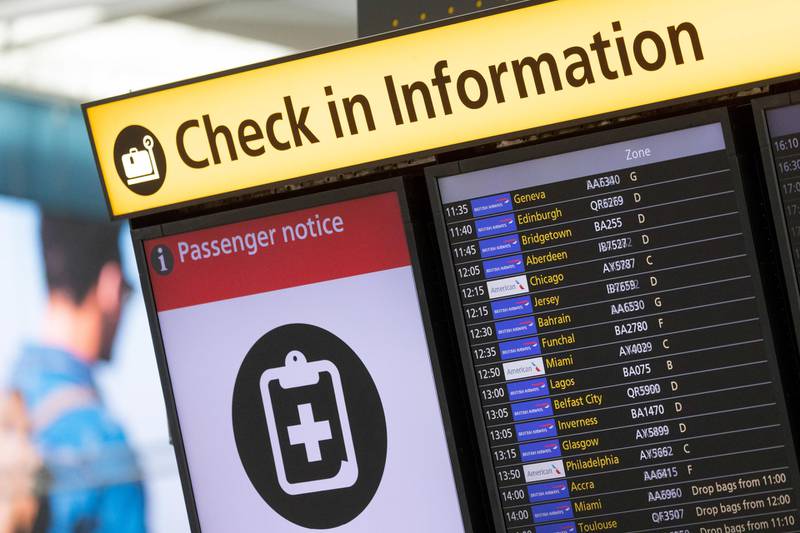 A digital display showing departing flights in the departures hall in Terminal 5 at London Heathrow. Bloomberg
