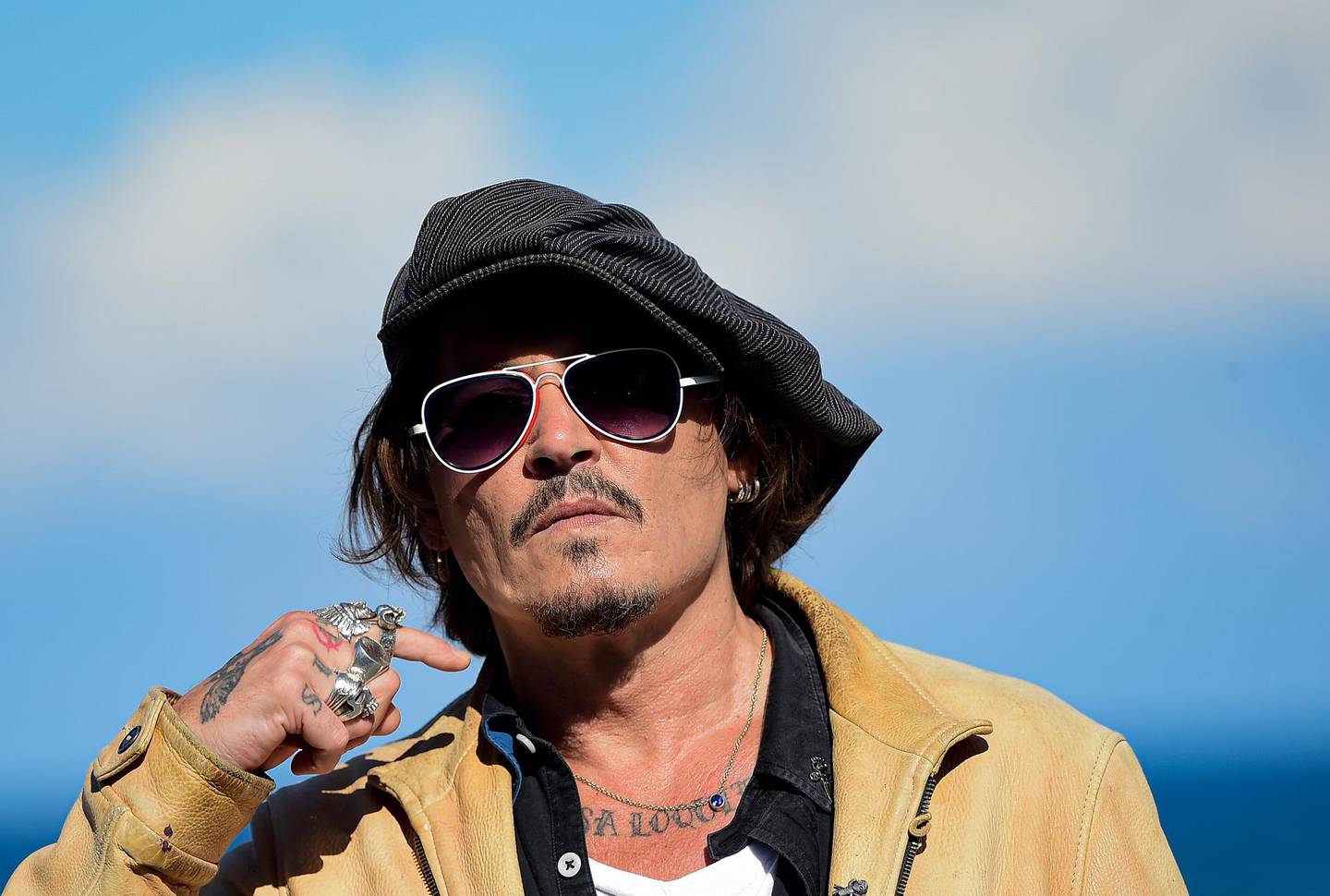 FILE - In this file photo dated Sunday, Sept. 20, 2020, US actor and film producer Johnny Deep during the photocall for his film "Crock of Gold: A Few Rounds with Shane Macgoman" at the 68th San Sebastian Film Festival, in San Sebastian, northern Spain.  In a letter to fans, Friday Nov.6, 2020, Depp said he had been "asked to resign" from his role in the Fantastic Beasts film franchise, after losing a libel case labelling him a wife beater, a judgement he said he plans to appeal against. (AP Photo/Alvaro Barrientos, FILE)