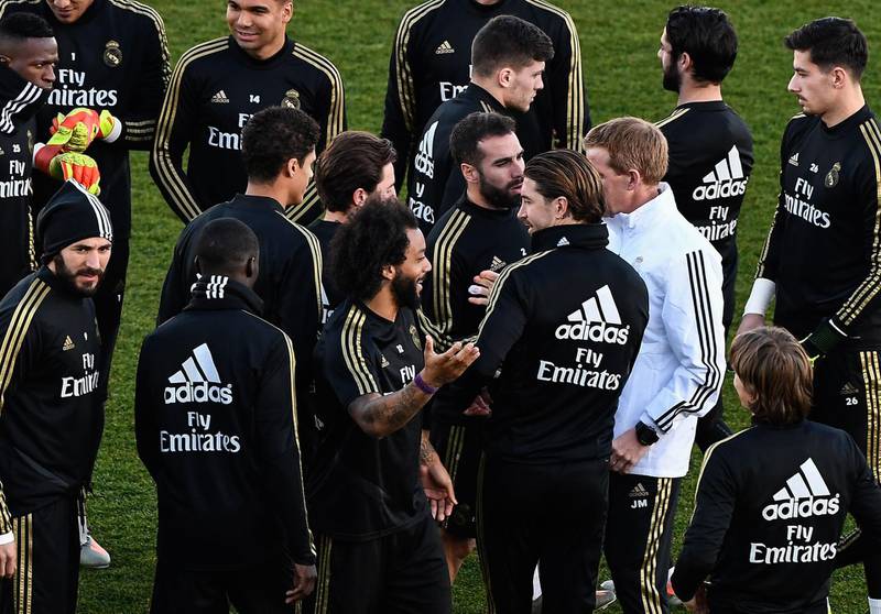 Real Madrid players at the public training session. AFP