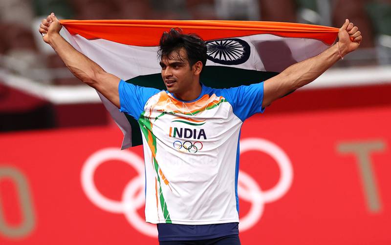 Neeraj Chopra of India celebrates after winning gold in the men's javelin throw.