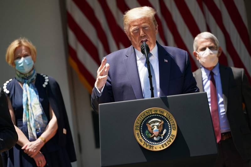 Meanwhile, US President Donald Trump continues to not wear a mask. Here. he speaks in the presence of Response coordinator for White House Coronavirus Task Force Deborah Birx, left, and Director of the National Institute of Allergy and Infectious Diseases Anthony Fauci in Washington. AFP