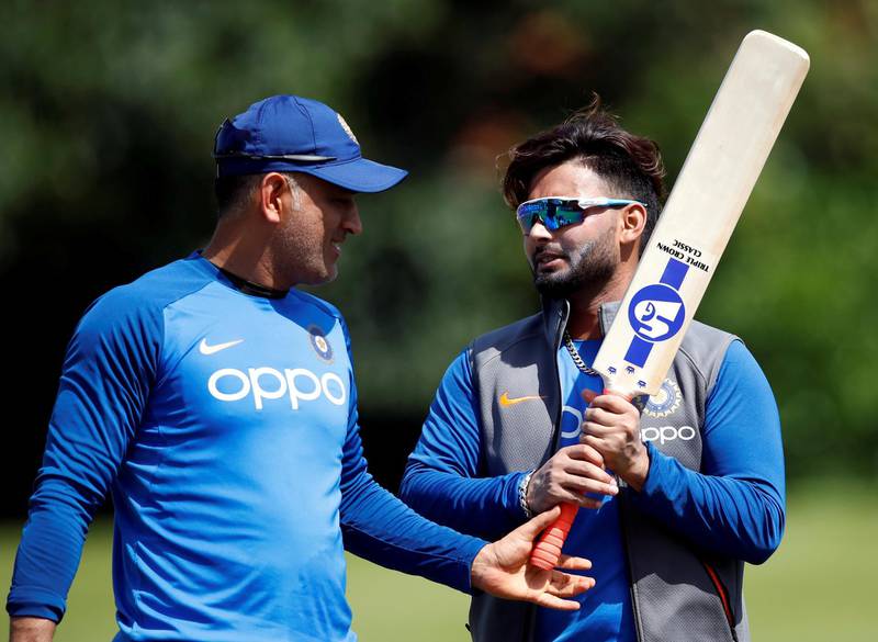 FILE PHOTO: Cricket - ICC Cricket World Cup - India Nets - Edgbaston, Birmingham, Britain - June 29, 2019   India's MS Dhoni (L) and Rishabh Pant during nets   Action Images via Reuters/Andrew Boyers/File Photo