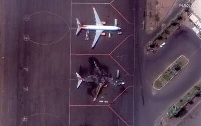 Satellite images show a destroyed Ukrainian plane at Khartoum International Airport. Reuters