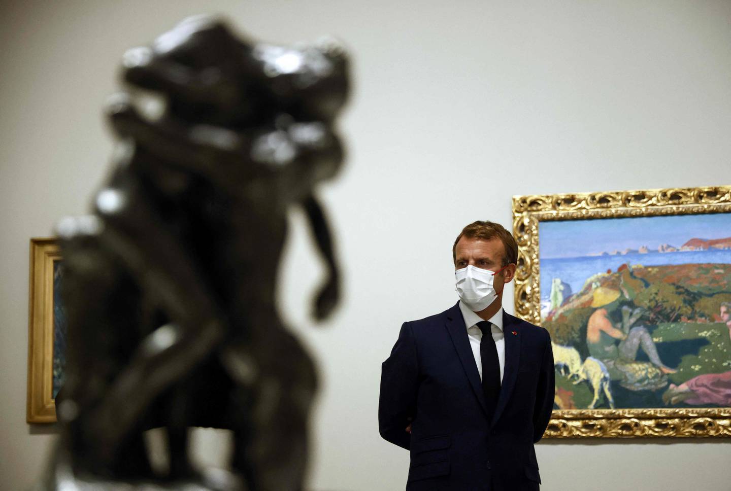 French President Emmanuel Macron visits the opening of the exhibition The Morozov Collection. Icons of Modern Art at Louis Vuitton Foundation in Paris, on September 21, 2021. AFP