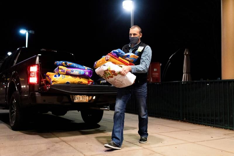Volunteers bring in supplies to the YMCA of Northern Colorado for people forced to leave their homes due to the fire. Reuters