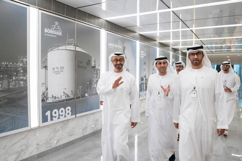 ABU DHABI, UNITED ARAB EMIRATES - November 04, 2019:  HH Sheikh Mohamed bin Zayed Al Nahyan, Crown Prince of Abu Dhabi and Deputy Supreme Commander of the UAE Armed Forces (L) tours the new expansion and development work at the Abu Dhabi National Oil Company (ADNOC) Headquarters. Seen with HE Dr Sultan Ahmed Al Jaber, UAE Minister of State, Chairman of Masdar and CEO of ADNOC Group (R).

( Hamad Al Kaabi / Ministry of Presidential Affairs )​
---
