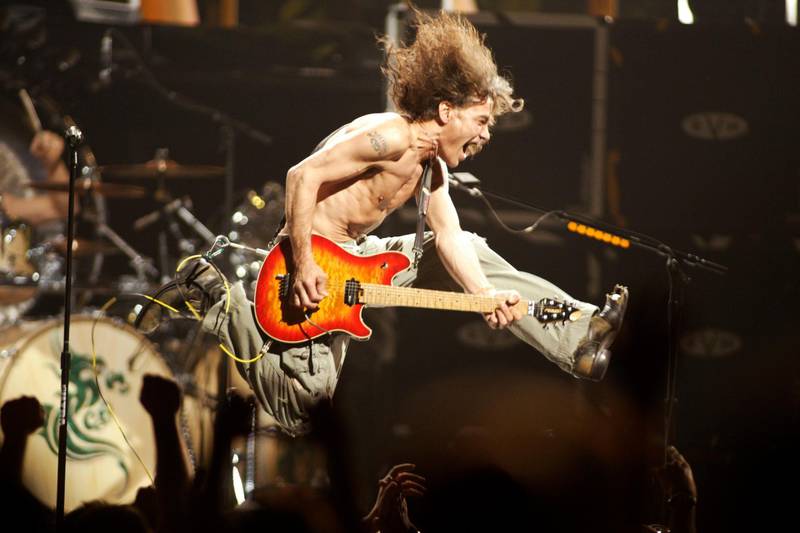 Eddie Van Halen plays the final chord of 'Jump' during the Van Halen concert at the Continental Airlines Arena in East Rutherford on June 22, 2004. AP