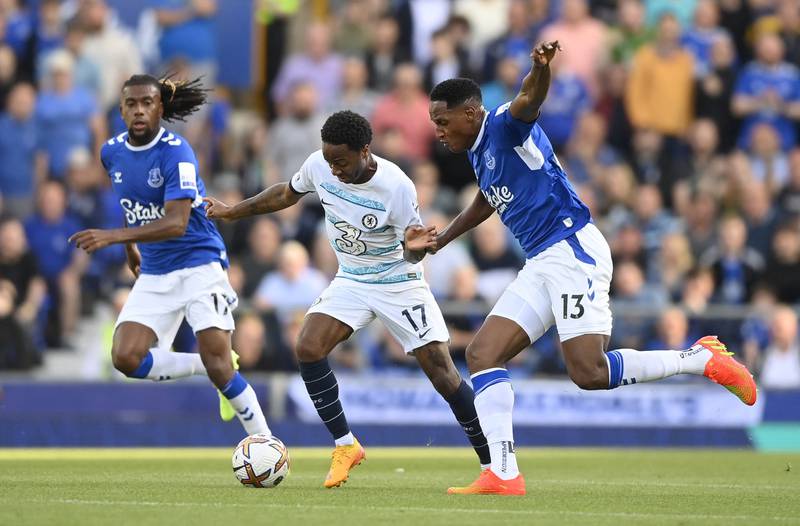 Chelsea's Raheem Sterling in action with Everton's Yerry Mina and Alex Iwobi. Reuters