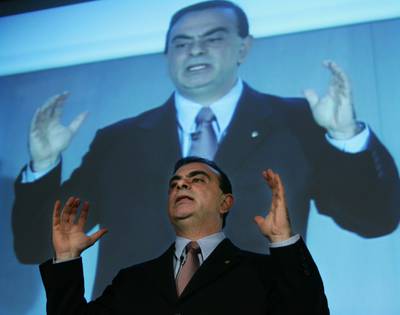 Former Renault-Nissan chief executive Carlos Ghosn speaks at news conference at the carmaker's Tokyo headquarters in 2004. Reuters