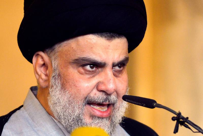 Iraqi Shiite cleric and political leader Moqtada al-Sadr delivers the Eid al-Fitr sermon during the Muslim holiday's morning prayer at the Grand Mosque of Kufa near the central Iraqi shrine city of Najaf, some 160 kilometres south of the capital Baghdad, on June 05, 2019. - Muslims worldwide celebrate Eid al-Fitr marking the end of the fasting month of Ramadan. (Photo by Haidar HAMDANI / AFP)